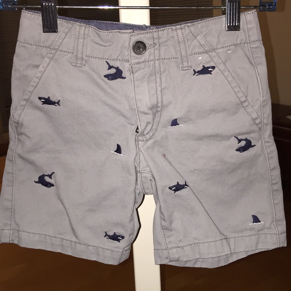 Gray shorts with navy sharks